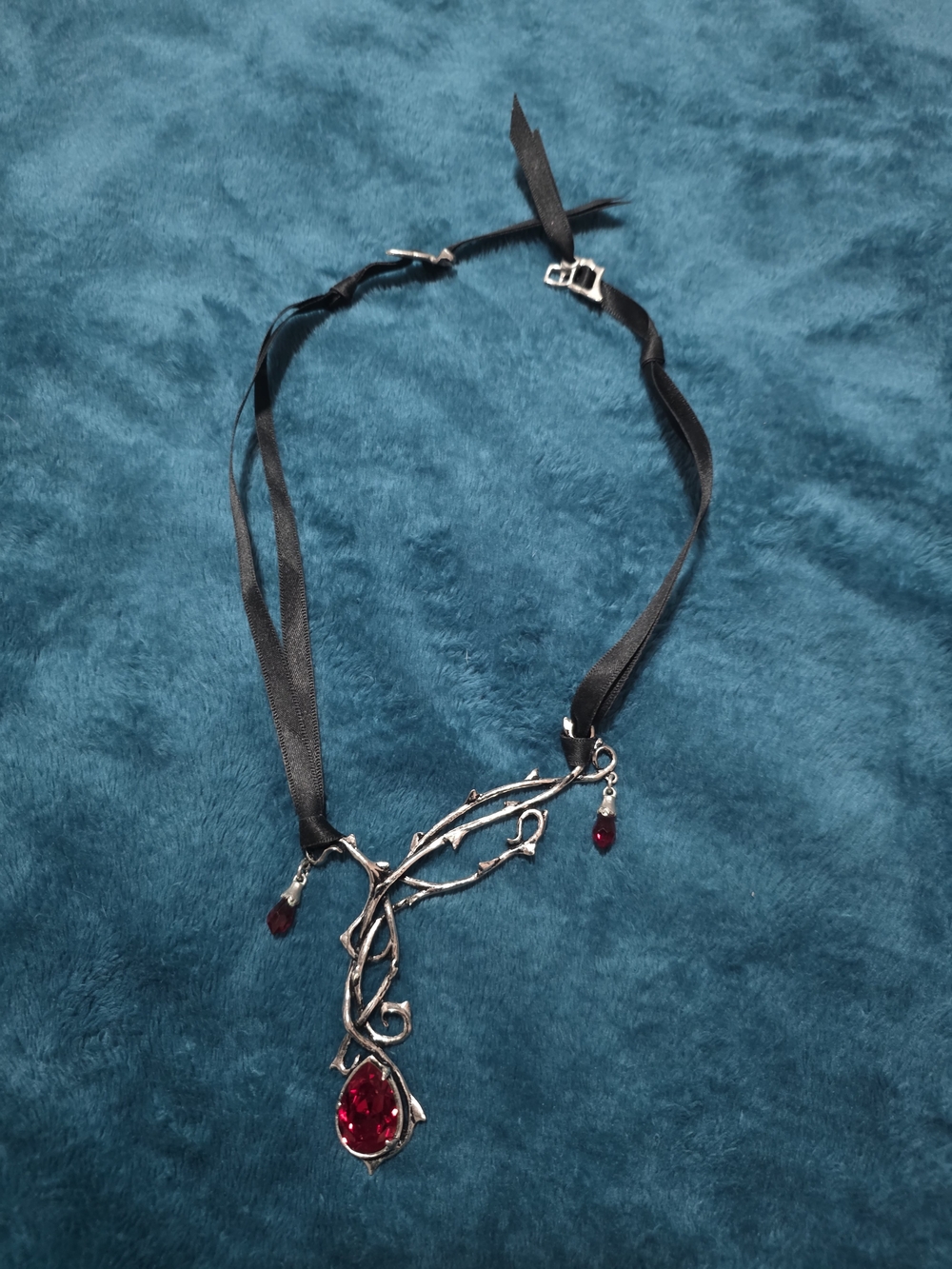 Silver Vine Necklace with Deep Red Teardrop Gem and Black Ribbon